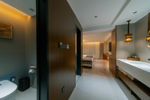 Koupelna v ubytování Jijia Inn