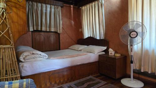 Moon Light Guest House 객실 침대