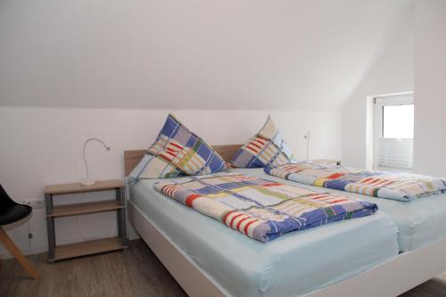 Postel nebo postele na pokoji v ubytování Kiek In