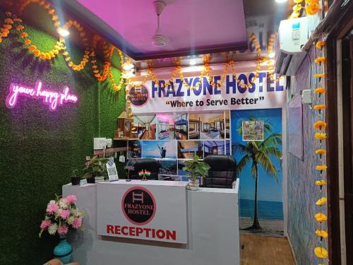 a shop with a sign that reads happyride the best where to serve better at Frazyone Hostel in New Delhi