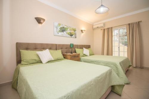 Postel nebo postele na pokoji v ubytování Villa Panoramica