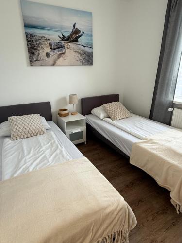 Postel nebo postele na pokoji v ubytování Dom Gościnny Ania