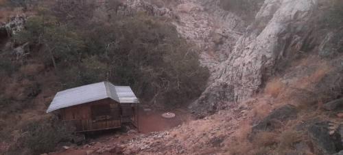 Afbeelding uit fotogalerij van Glocke Mountain Camp, Cabin in Outjo