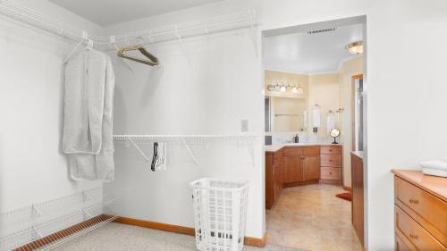 a bathroom with a walk in shower and a sink at Seacliff Haven Waterfront Luxury Stunning Views Hot Tub Game Room in Coupeville