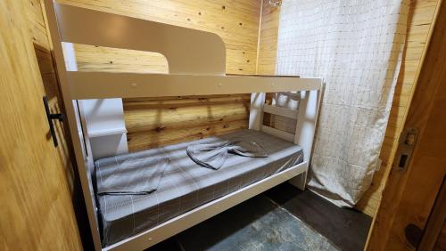 Ένα ή περισσότερα κρεβάτια σε δωμάτιο στο Casa Container Branca