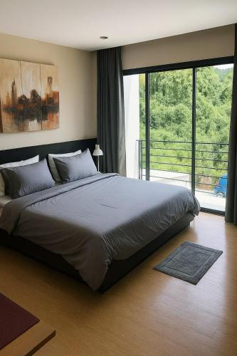 Postel nebo postele na pokoji v ubytování Appartement 2 Chambres Tropical Sûr et Économique