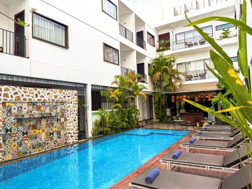 an image of a swimming pool at a hotel at The Calm Oasis in Siem Reap