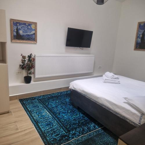 Postel nebo postele na pokoji v ubytování Ariana house