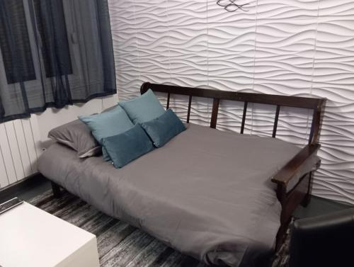 Llit o llits en una habitació de Studio Miribel