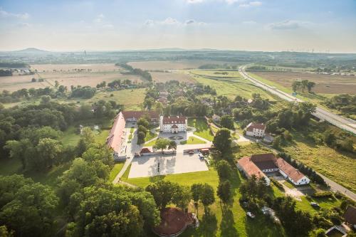 an aerial view of a mansion in a field at Pałac Łagów in Zgorzelec