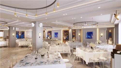 a banquet hall with white tables and chairs at Art Hotel in Chişinău