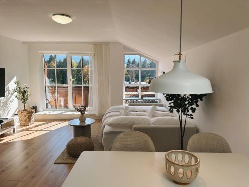 Posezení v ubytování Flow Living I Zentrale Fewo mit schönem Bergblick