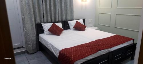 Postel nebo postele na pokoji v ubytování Olive Inn Apartment