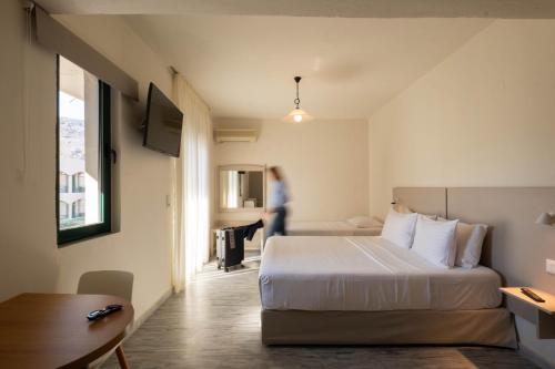 Postel nebo postele na pokoji v ubytování Romantica Hotel