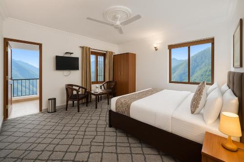 Postel nebo postele na pokoji v ubytování Sitara Hotel & Resort - Most Selling Property in Nainital