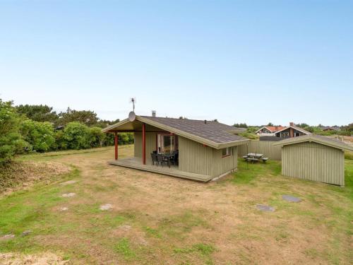 an image of a house with a yard at Holiday Home Siv - from the sea by Interhome in Bjerregård