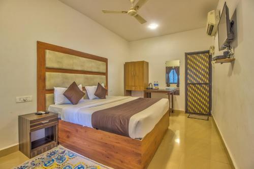 Postel nebo postele na pokoji v ubytování Hotel Flamingo