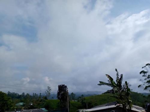 a view of a city with a cloudy sky at Argyle Rock Bungalow in Hatton