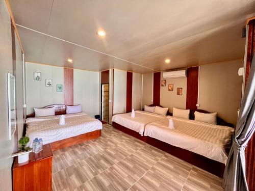 En eller flere senge i et værelse på Seaview Guesthouse