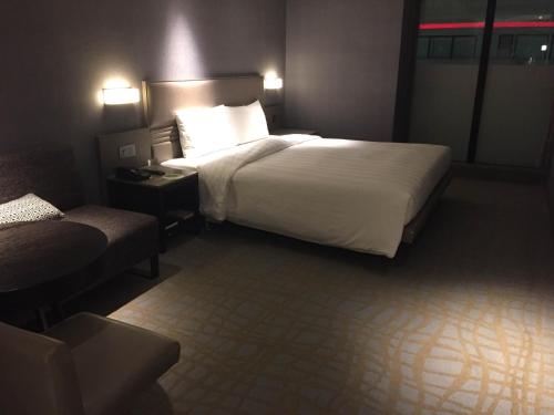Katil atau katil-katil dalam bilik di Hotel Midtown Richardson