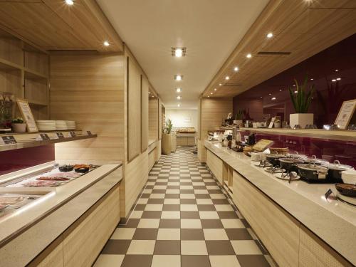 Una cocina o zona de cocina en Pullman Munich