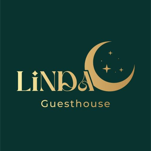 a sign for a mosque with a moon and stars at Linda rooms in Chanthaburi