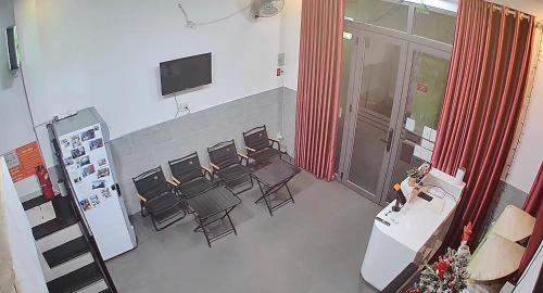 an overhead view of a room with chairs and a table at Elegant Hostel Saigon - District 3 in Ho Chi Minh City