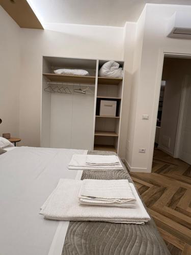 Ένα ή περισσότερα κρεβάτια σε δωμάτιο στο Luxury Apartment, Appartamento a Passignano sul Trasimeno