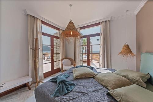 Postel nebo postele na pokoji v ubytování Villa Port Verd