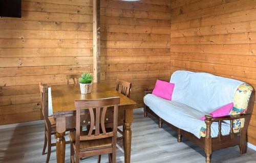a dining room with a table and a chair at Country House Chiciabocca in Apecchio