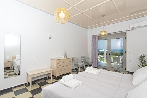 Postel nebo postele na pokoji v ubytování Akti Villa