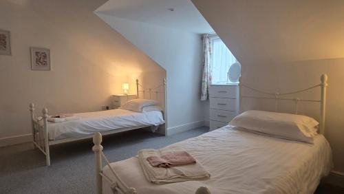 Postel nebo postele na pokoji v ubytování Benita - Apartment 2