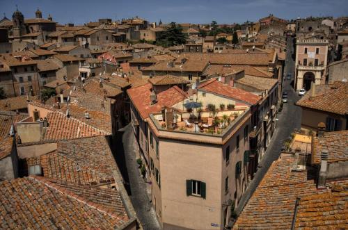 an aerial view of a city with roofs at La Terrazza in Tuscania