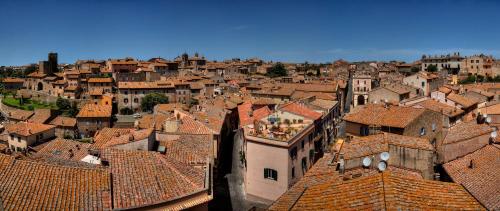 an aerial view of a city with roofs at La Terrazza in Tuscania
