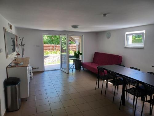 Posezení v ubytování Relax Porta Vendégház Orfű