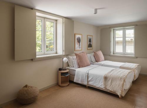 Postel nebo postele na pokoji v ubytování Casa da Ponte