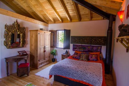 Katil atau katil-katil dalam bilik di Casa con encanto el Castaño