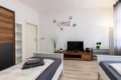 Photo de la galerie de l'établissement FLEX Aparts - möblierte Wohnung in Zwickau, à Zwickau