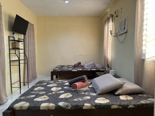 Postel nebo postele na pokoji v ubytování Mi casa suites