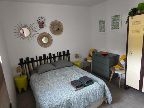 Llit o llits en una habitació de Près colmar 6