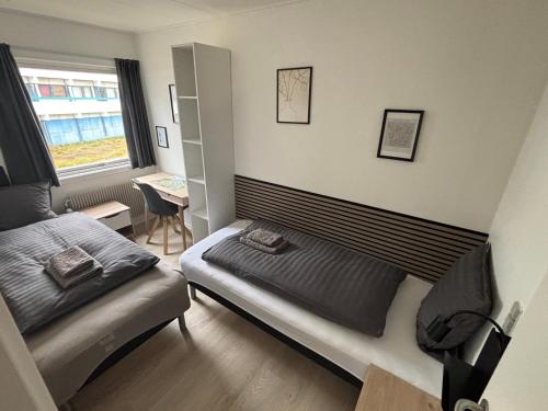 Χώρος καθιστικού στο Nuuk City Apartments