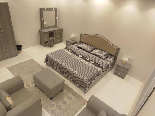 Postel nebo postele na pokoji v ubytování Salam Apartments 3 Three bedrooms, two bathrooms, a hall and a kitchen C-3