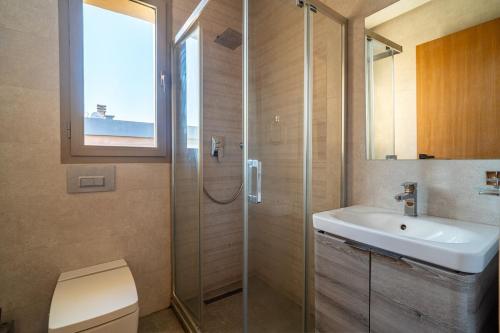 Et badeværelse på Zen Villa Private Parking