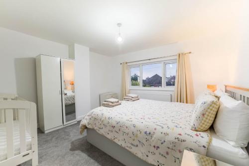 Ένα ή περισσότερα κρεβάτια σε δωμάτιο στο 3 Bed House Sleeps 6 - Free Parking -Tv & Wi-Fi
