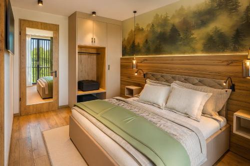 Postel nebo postele na pokoji v ubytování Ferienwohnung Tenne - Weissnhof