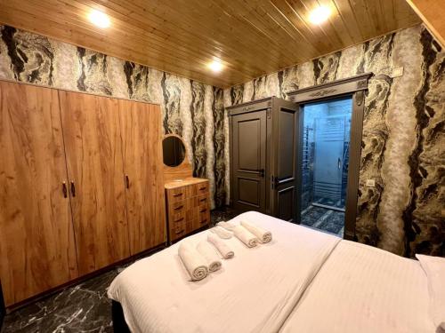 Ένα ή περισσότερα κρεβάτια σε δωμάτιο στο Panorama of the Mountains