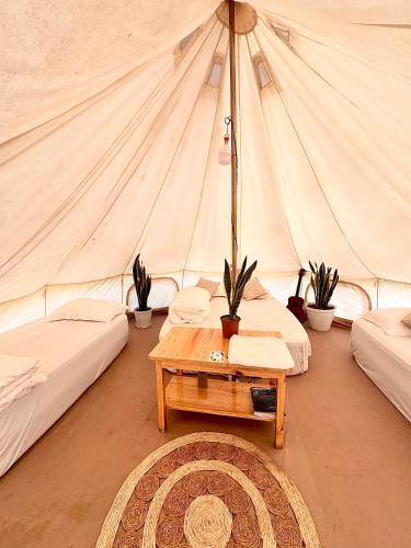 Hideaway Glamping 객실 침대