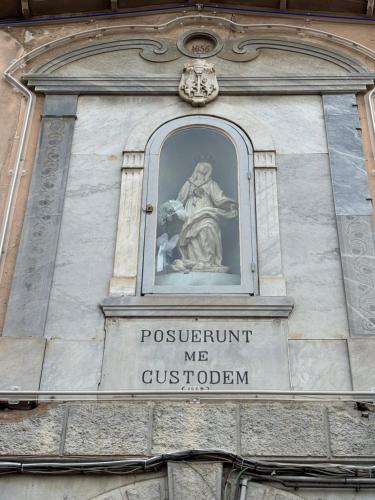 a statue on the side of a building at Eden Studio in Ajaccio