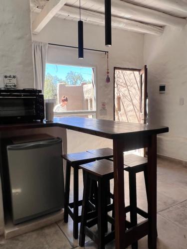 Kuchyň nebo kuchyňský kout v ubytování Los tarcos Guest House TILCARA LOFT