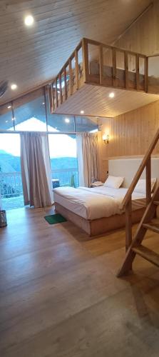 Postel nebo postele na pokoji v ubytování Harshvan Resort